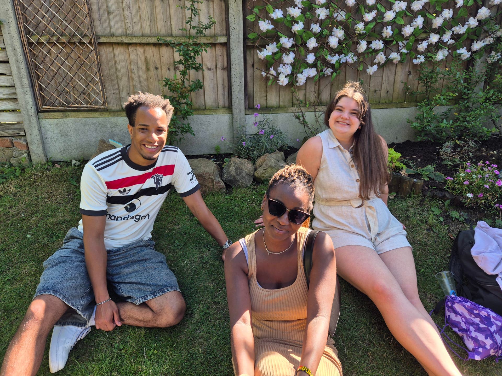 Members gathered outdoors at a church BBQ